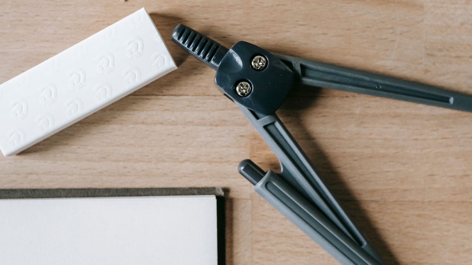 School supplies on a wooden table, a 50/50 custody schedule and the school year